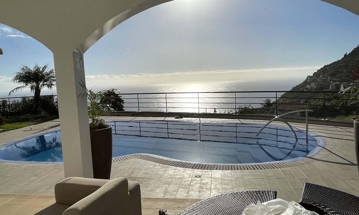 Arco da Calheta Villa | Luxury villa with private heated pool, garden and views of the sea and mountains