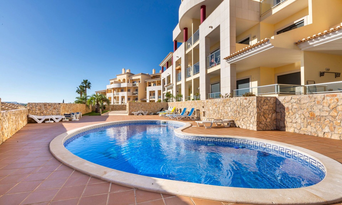 Olhos D'Agua Apartment | Solmar Garden View Apartment: Pool, Wi-Fi & Air Conditioning