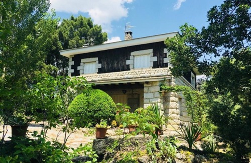 Valdemanco House | Charming rustic cabin with a fabulous garden