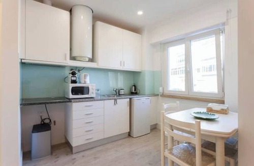 Santa Engracia Apartment | Grace Garden Home a natural garden facing the river in the center of Lisbon