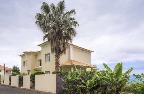 Arco da Calheta Villa | Luxury villa with private heated pool, garden and views of the sea and mountains