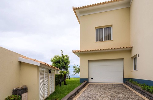 Arco da Calheta Villa | Luxury villa with private heated pool, garden and views of the sea and mountains
