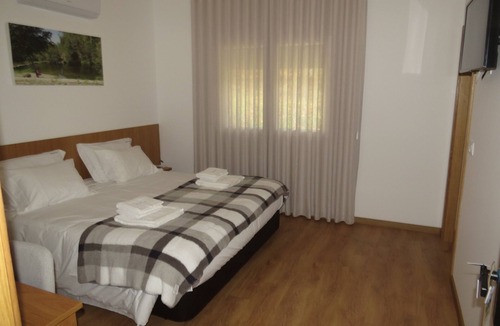 Reriz Villa | MANECAS HOUSE CREATIVE offers an outdoor swimming pool and barbecue area.