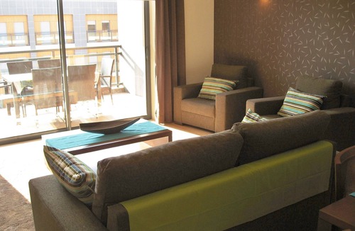 Olhao Apartment | Top-floor frontline apartment, sea views, rooftop pool, easy walk historic Olhao