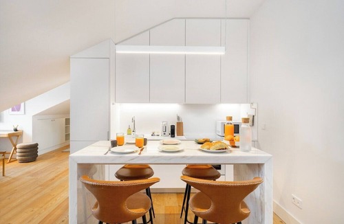 Santa Maria Maior Apartment | Top-Floor Studio in Prime Location