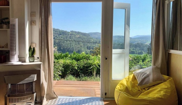1 bedroom wooden caravan with pool and barbecue. sleeps up to 3 people in Formariz