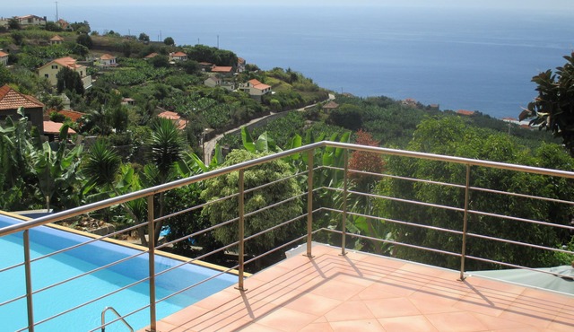 Apartment with sunny south west location and sea view, scenic, large terraces in Arco da Calheta