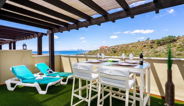 Penthouse with magnificent views of Gibraltar, south-southwest orientation. in Manilva