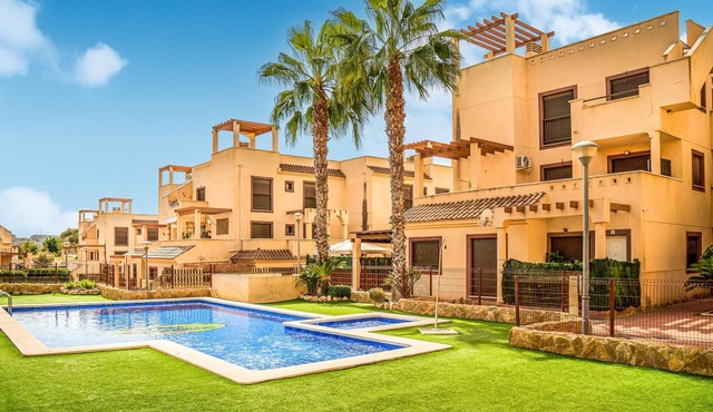 Spacious and practical vacation apartment in a gated community with communal pools. in Águilas