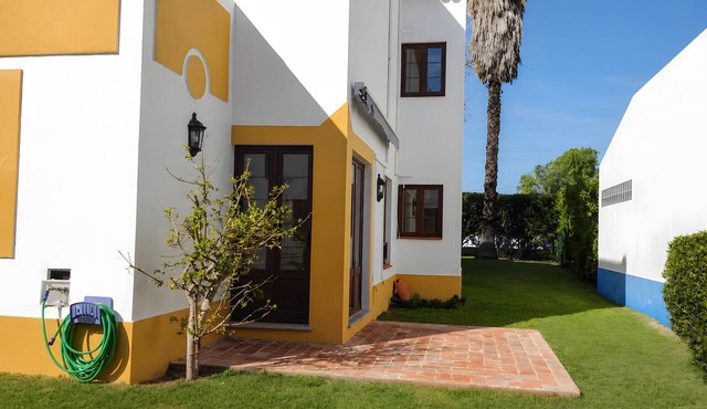 Spacious Villa with Private Garden and Shared Pool in Cabanas